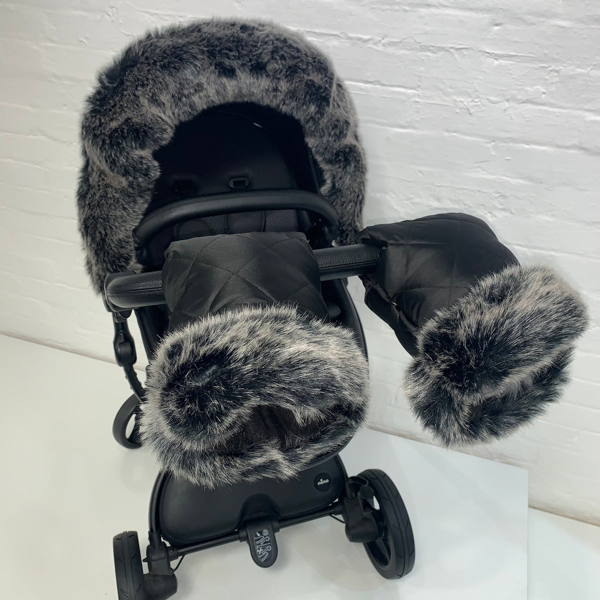 Fur hood outlet for egg pram