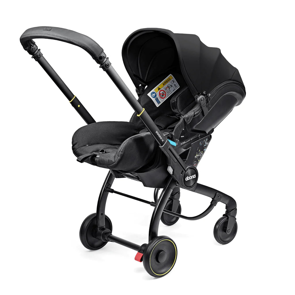 Doona X Car Seat & Stroller | Nitro Black (FREE Essentials Bag)